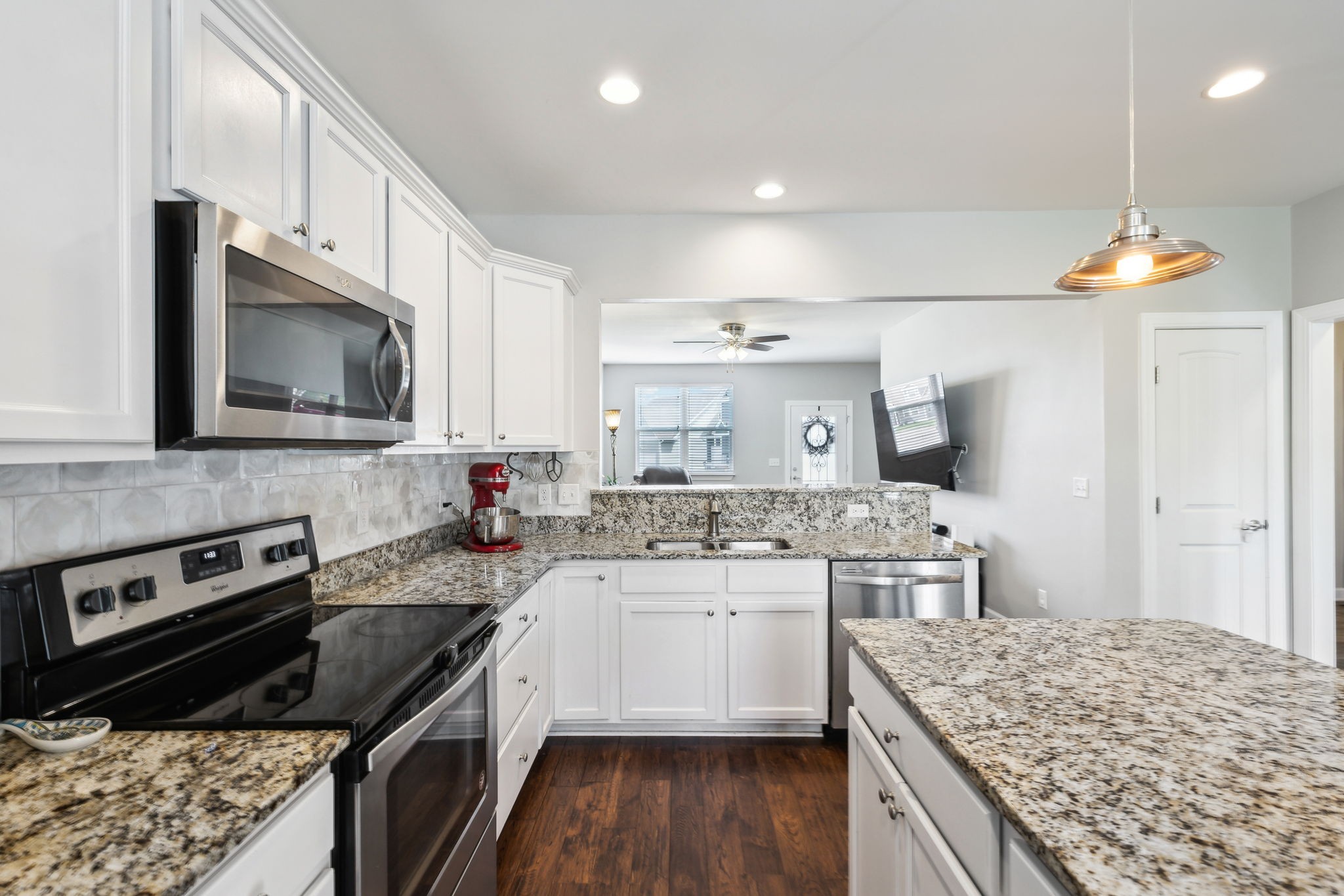 712 Ellie Drive Madison, TN 37115 - Photo 12 of 35 a kitchen with a sink stove top oven and refrigerator