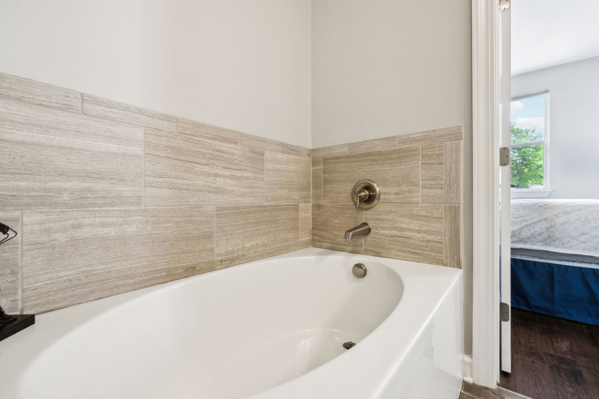 712 Ellie Drive Madison, TN 37115 - Photo 20 of 35 a bathroom with a bathtub and shower