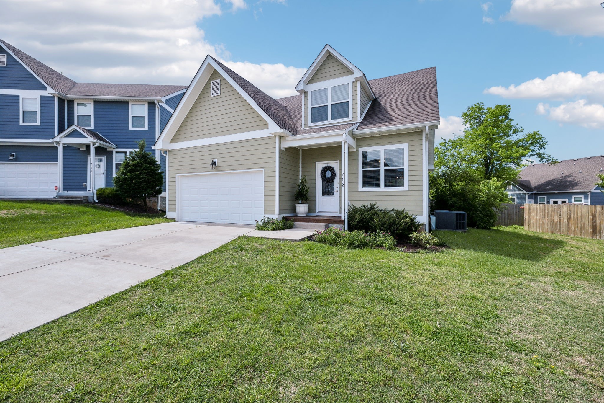 712 Ellie Drive Madison, TN 37115 - Photo 2 of 35 a front view of a house with a yard and garage