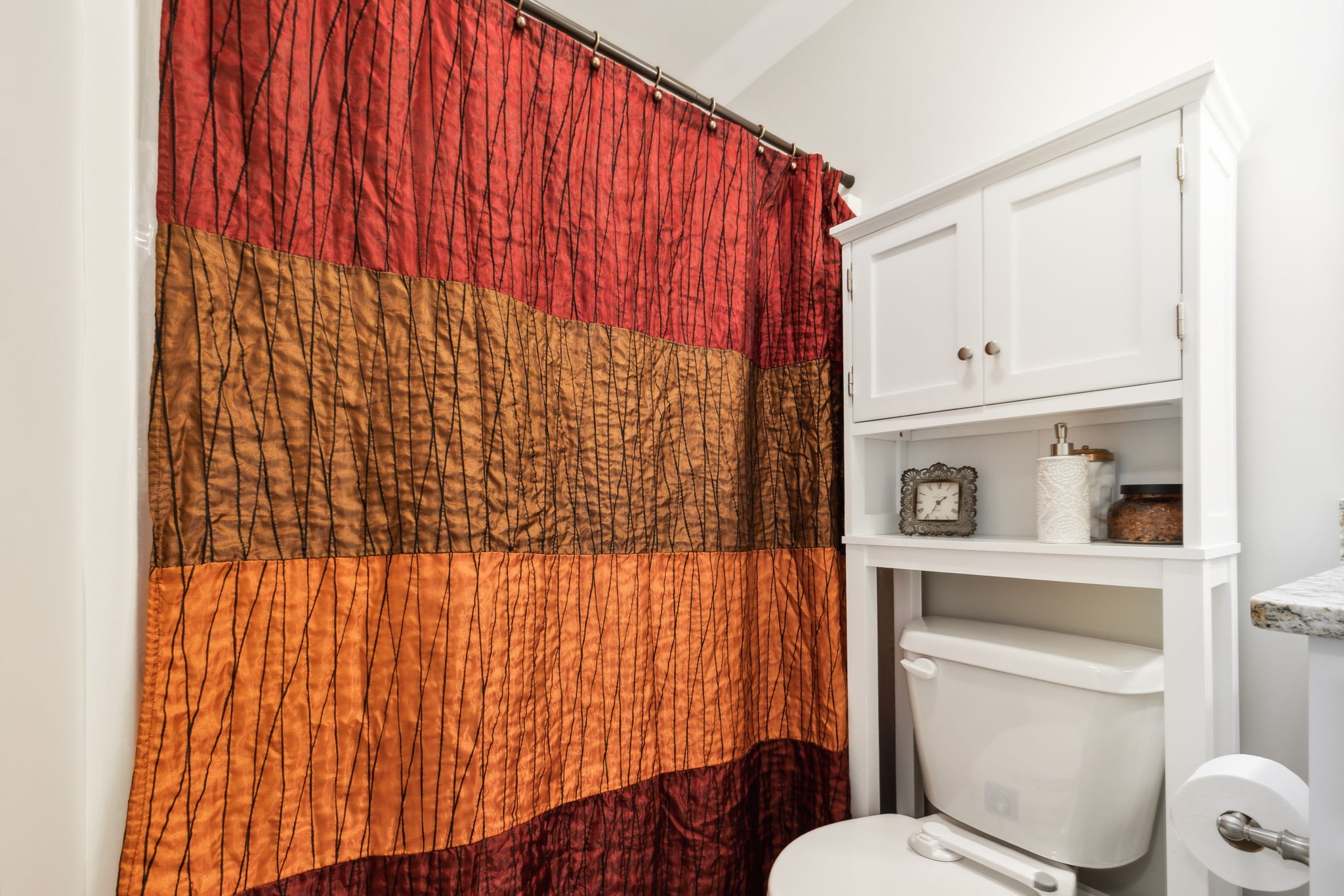 712 Ellie Drive Madison, TN 37115 - Photo 24 of 35 a bathroom with a toilet and shower curtain