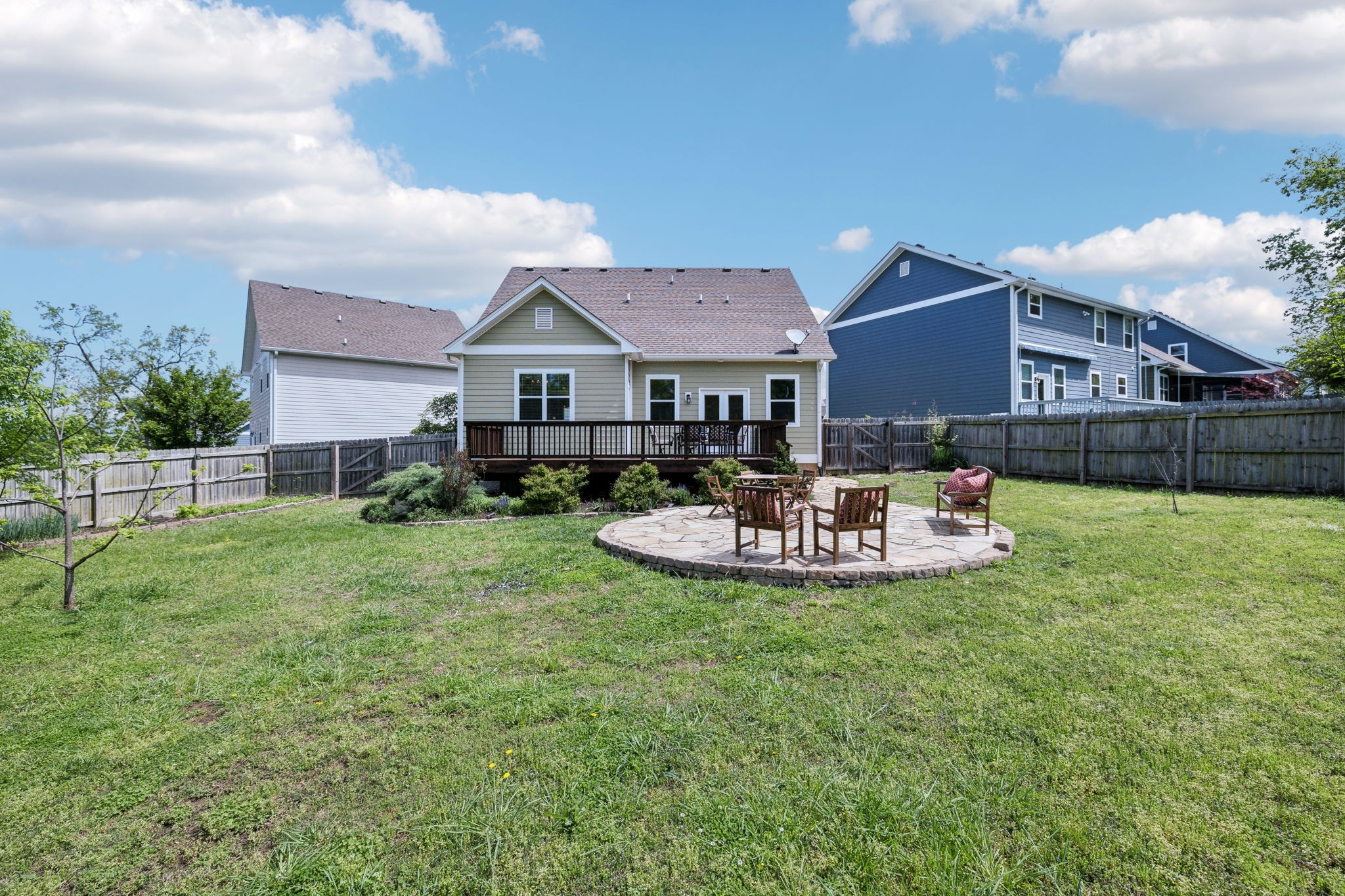 712 Ellie Drive Madison, TN 37115 - Photo 32 of 35 a view of a house with a backyard porch and sitting area