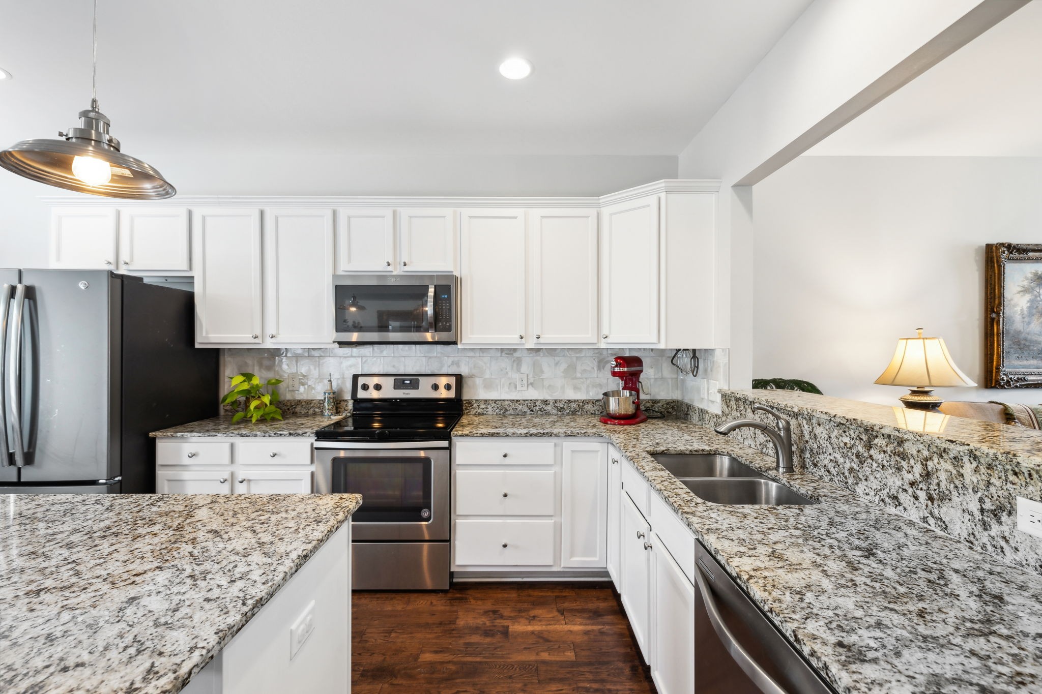 712 Ellie Drive Madison, TN 37115 - Photo 8 of 35 a kitchen with a stove sink and refrigerator
