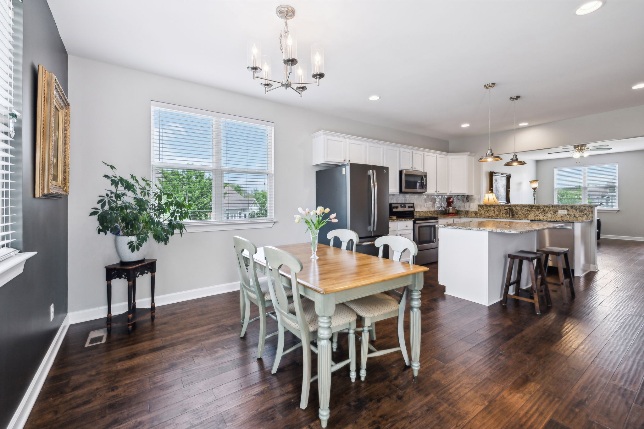 712 Ellie Drive Madison, TN 37115 - Photo 10 of 35 a view of a dining room with furniture and wooden floor