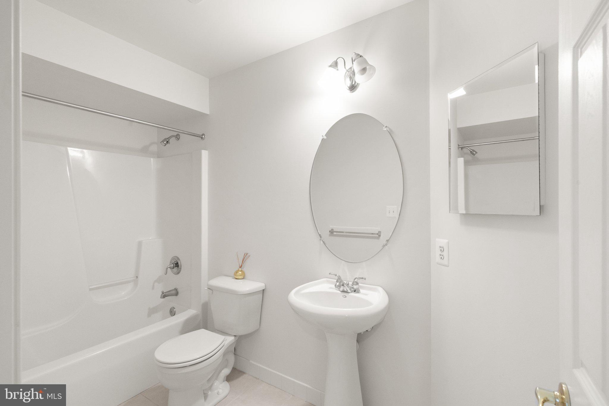 511 Copeland Road Fallston, MD 21047 - Photo 27 of 49 a bathroom with a toilet sink and mirror