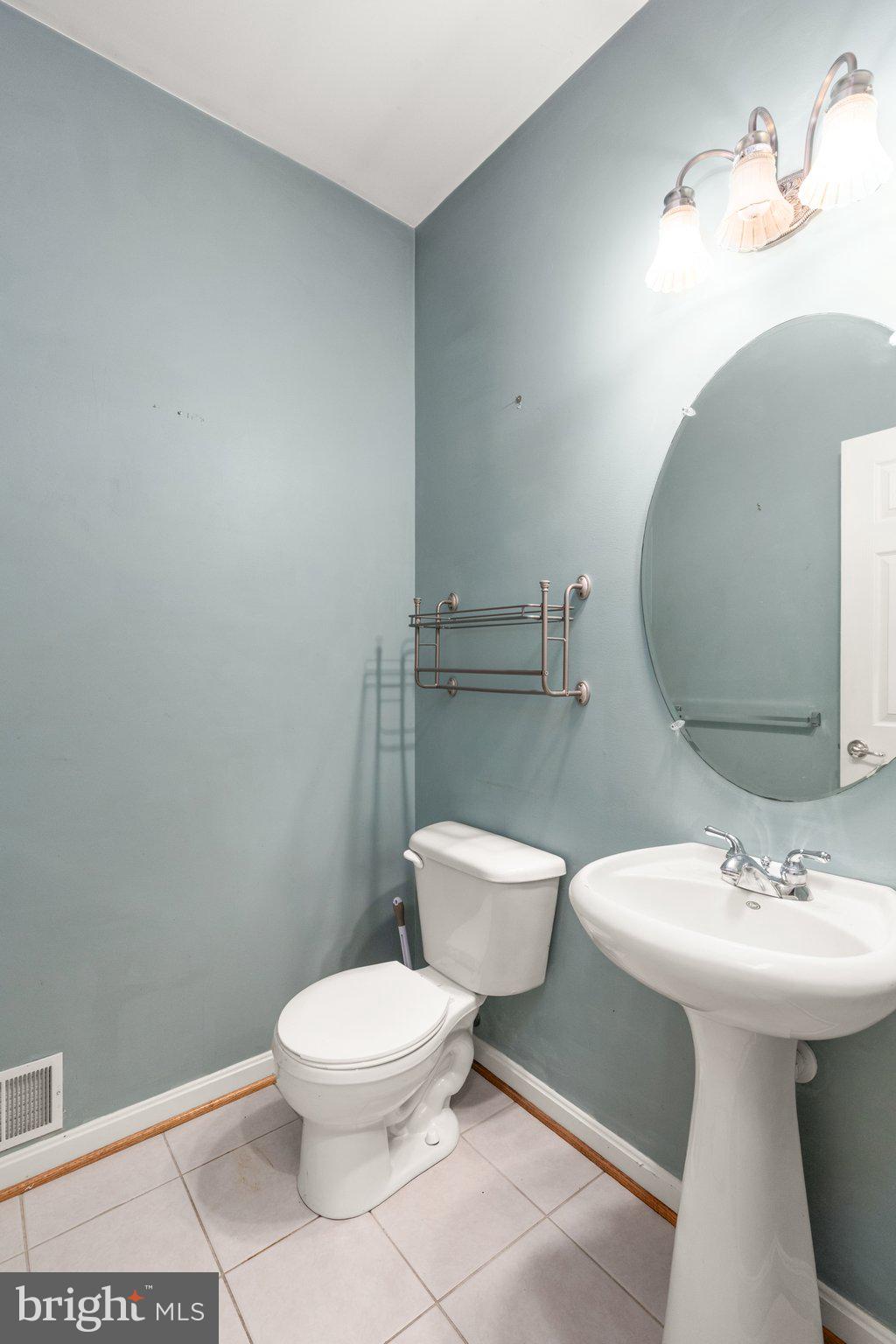 511 Copeland Road Fallston, MD 21047 - Photo 4 of 49 a bathroom with a toilet sink and mirror