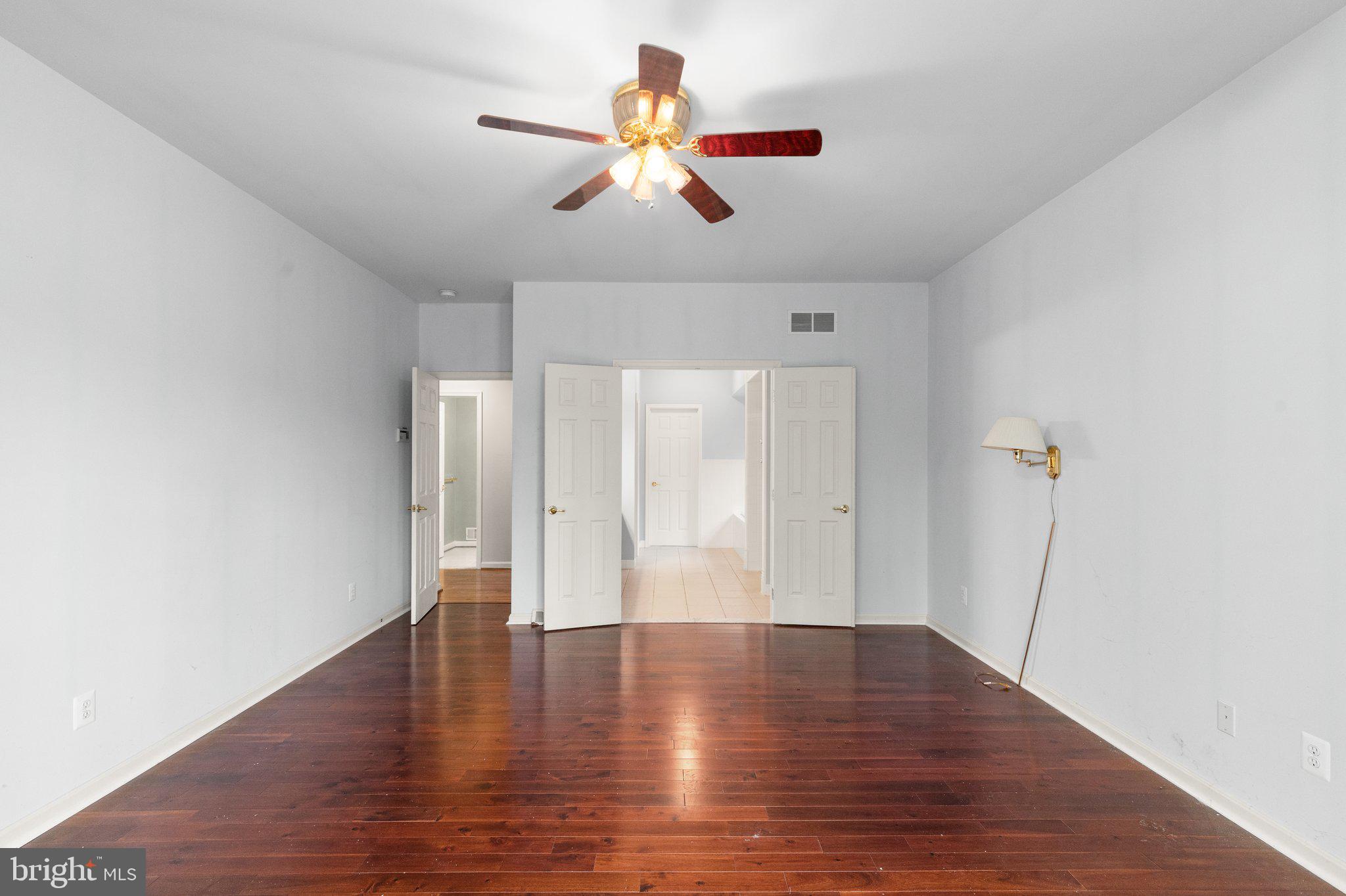 511 Copeland Road Fallston, MD 21047 - Photo 6 of 49 a view of an empty room with wooden floor