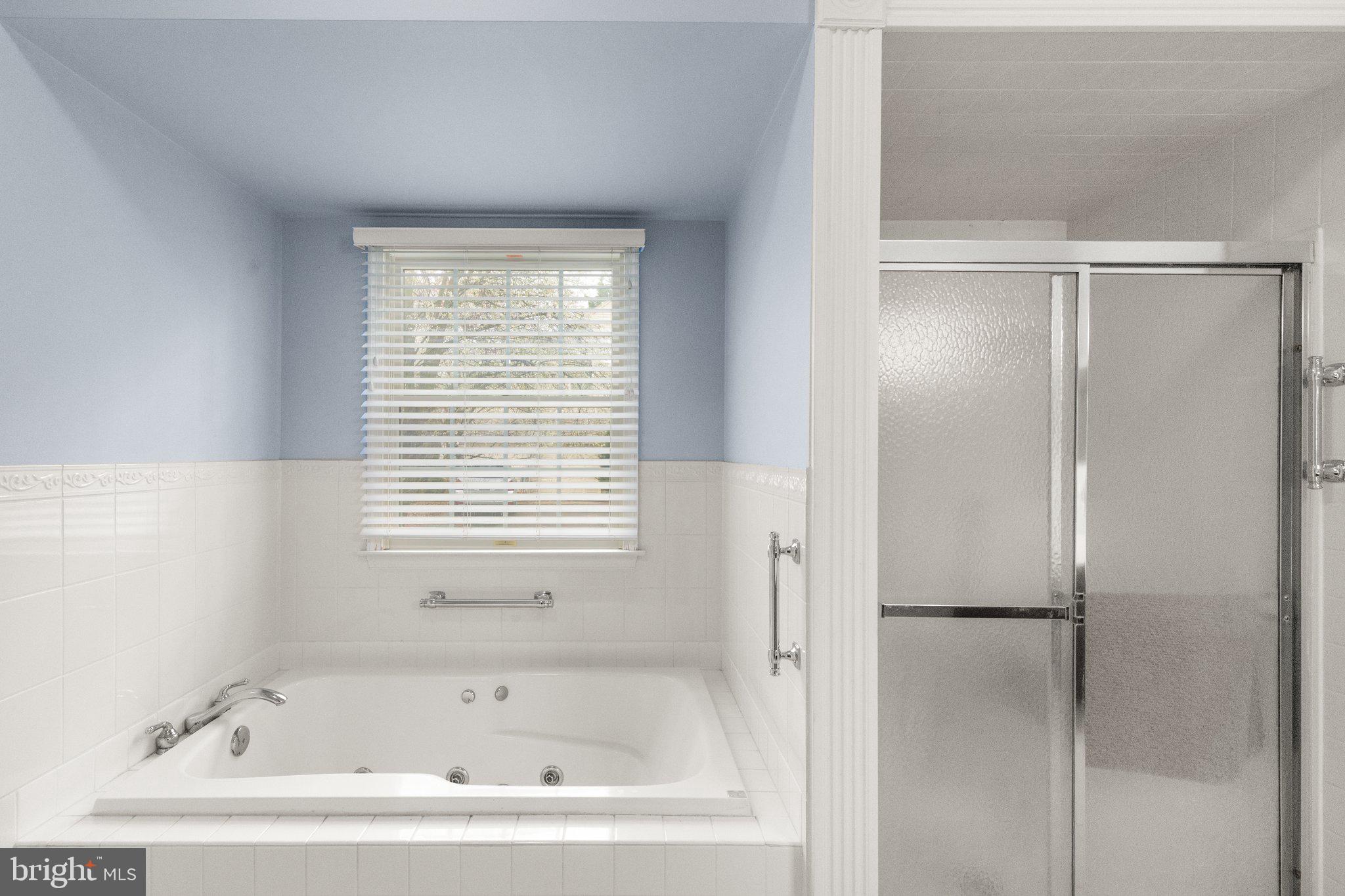 511 Copeland Road Fallston, MD 21047 - Photo 9 of 49 a white bath tub sitting next to a window