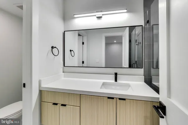 a view of staircase with white walls