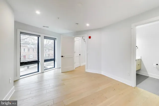 a view of entryway and hall with a window