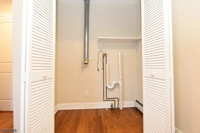 a bathroom with a tub and a shower