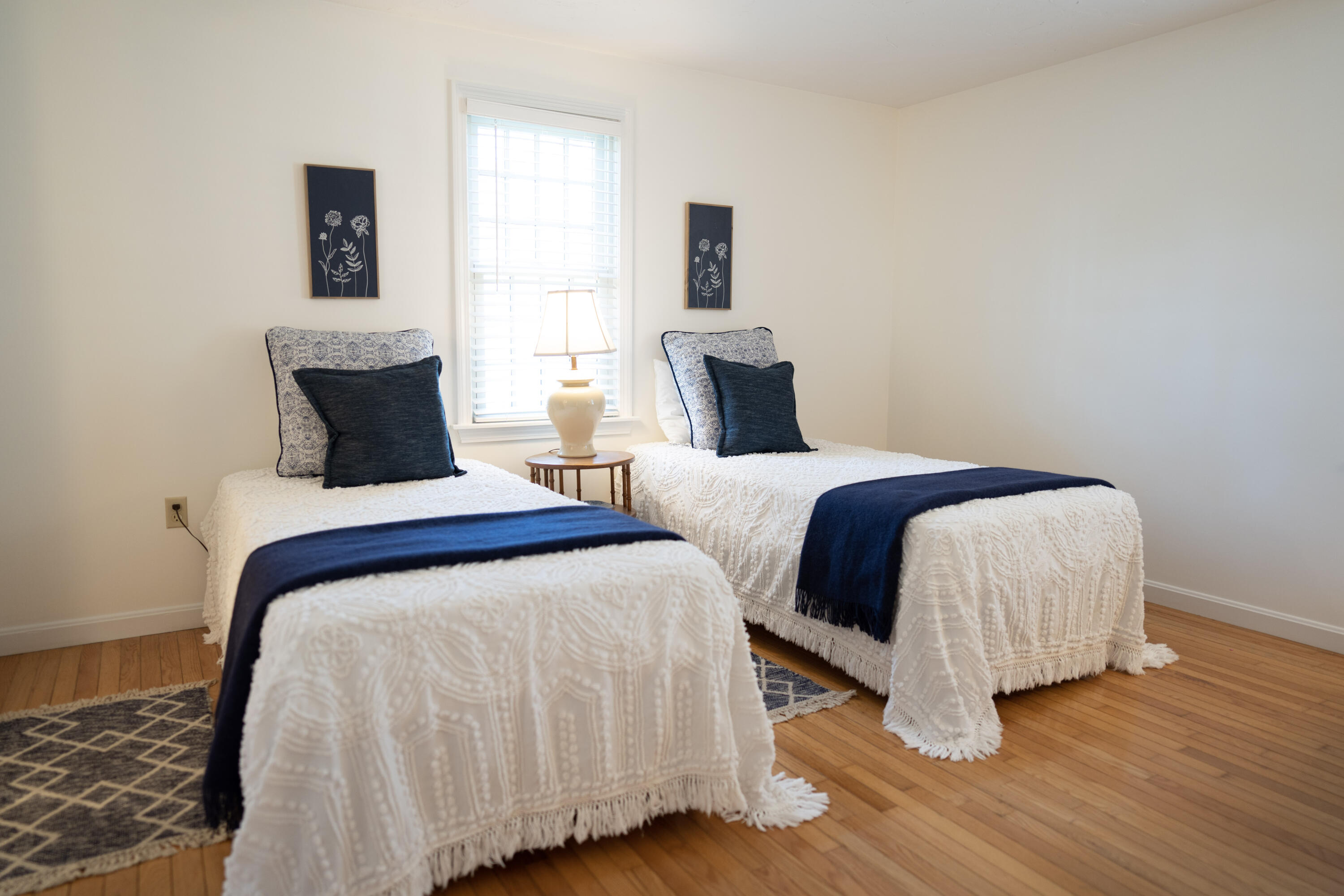 72 Cove Road South Dennis, MA 02660 - Photo 25 of 37 a bedroom with two beds and a night stand