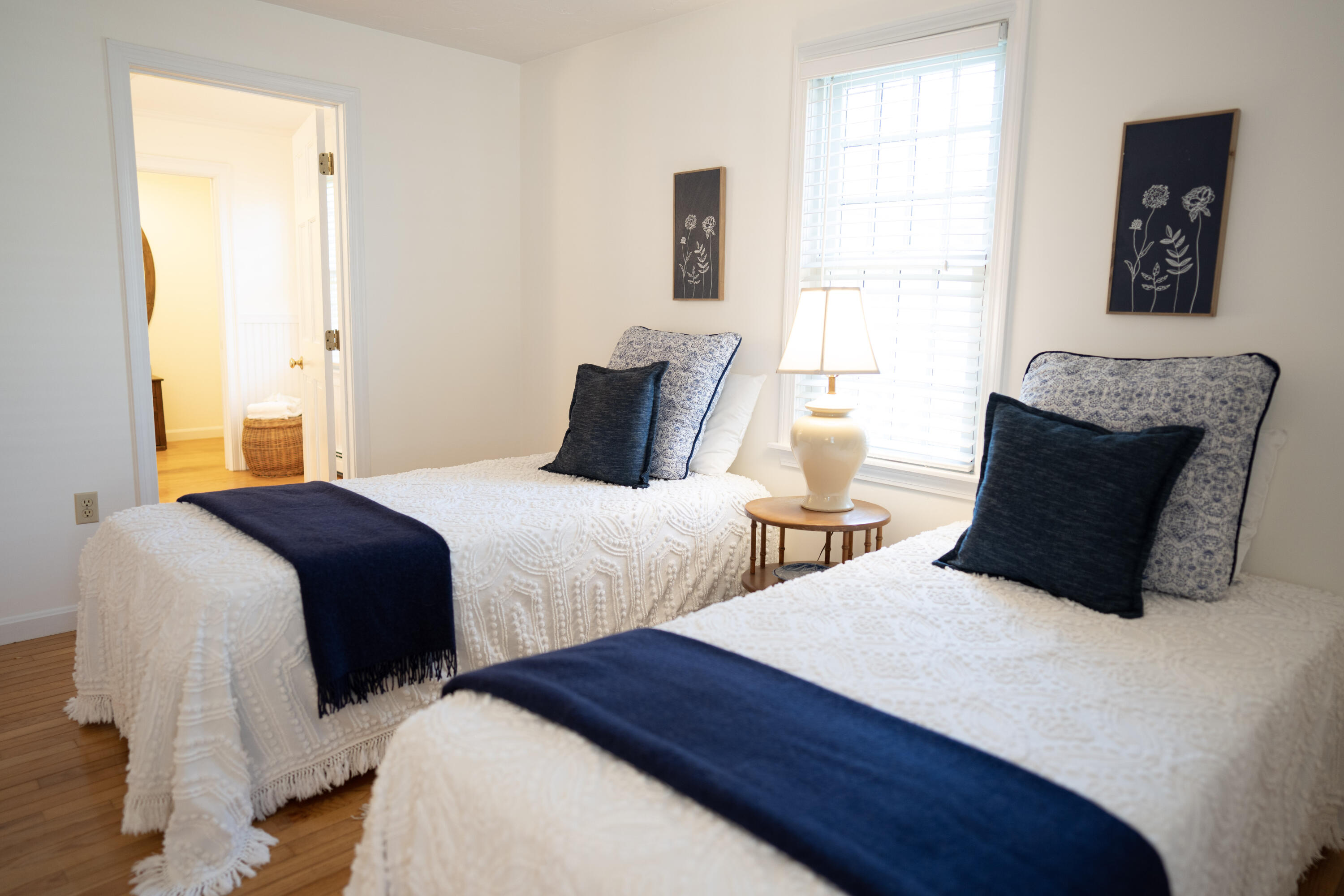 72 Cove Road South Dennis, MA 02660 - Photo 27 of 37 a bedroom with two beds and a window