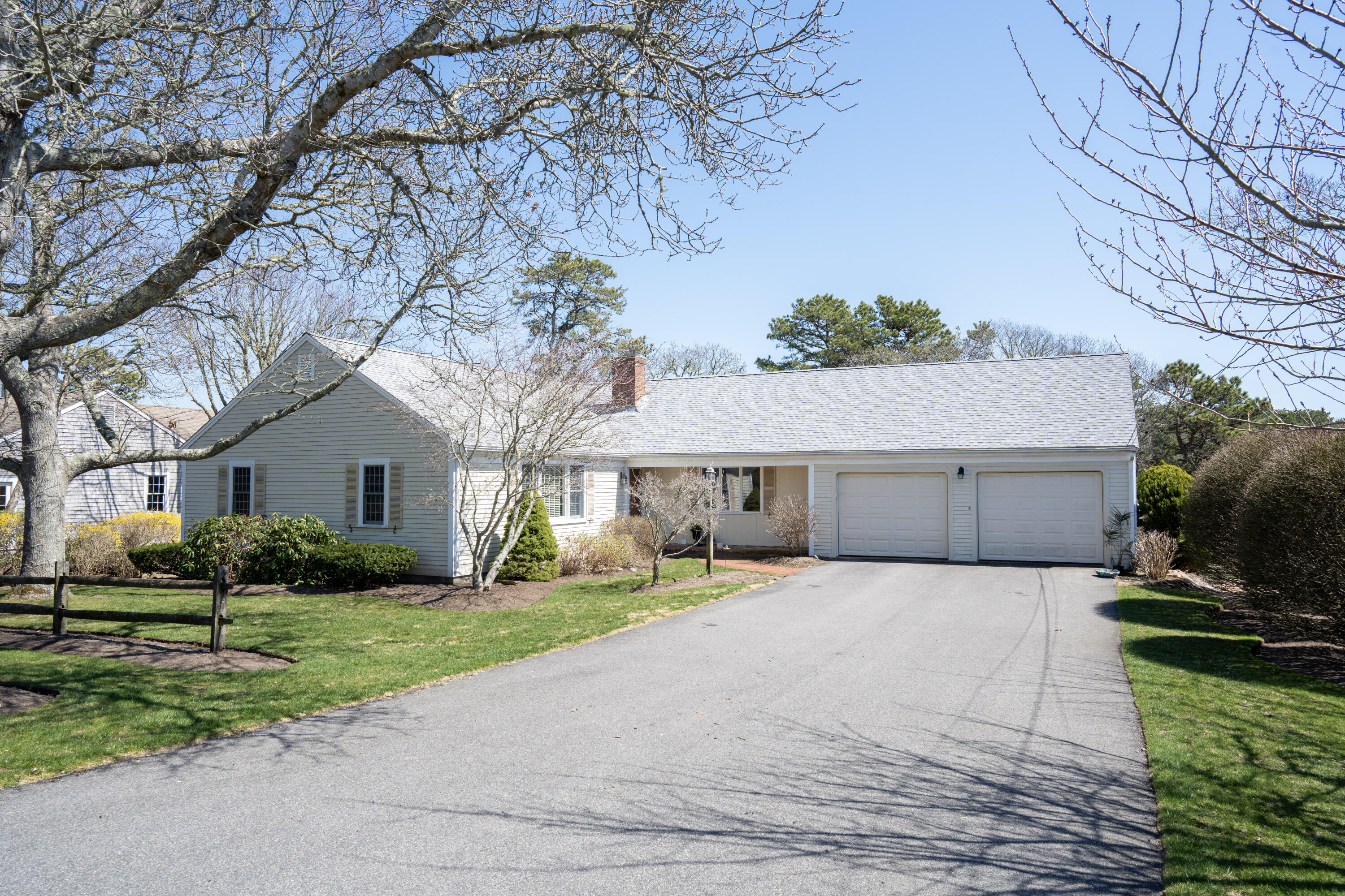 72 Cove Road South Dennis, MA 02660 - Photo 3 of 37 a front view of house with yard and green space