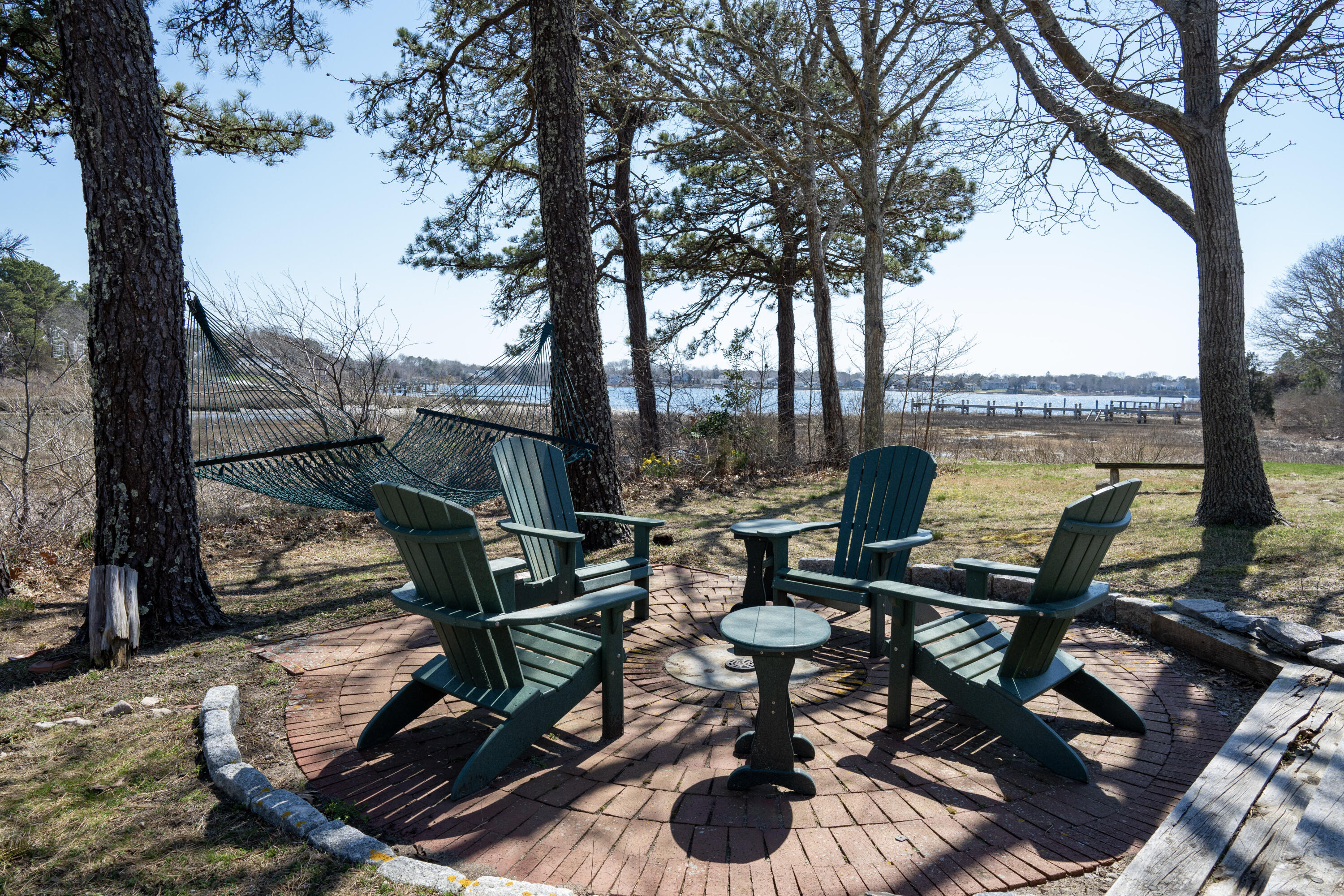 72 Cove Road South Dennis, MA 02660 - Photo 35 of 37 a view of a ocean from a bench