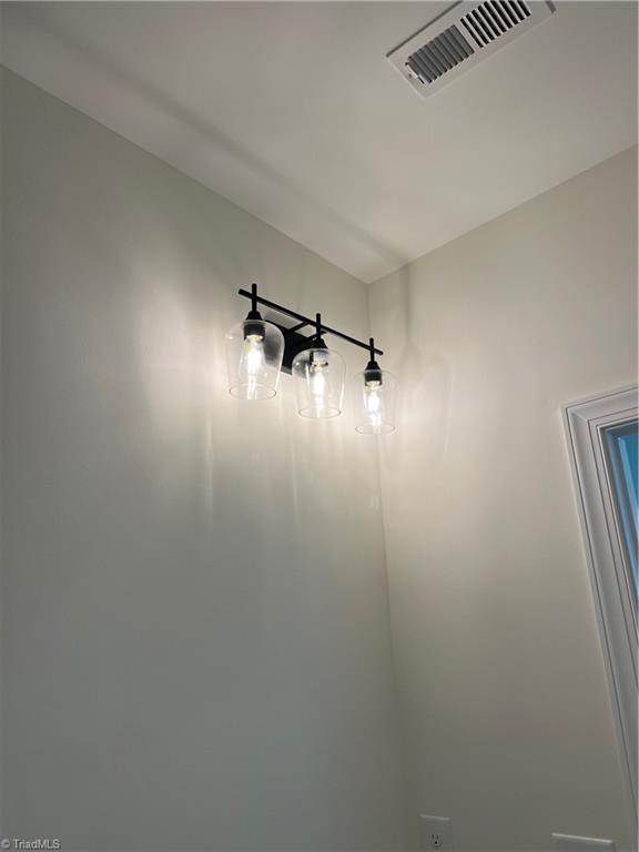 132 Koontz Avenue Lexington, NC 27295 - Photo 21 of 25 Builder does not include mirrors. Buyer can buy them and contractor will hang them up.