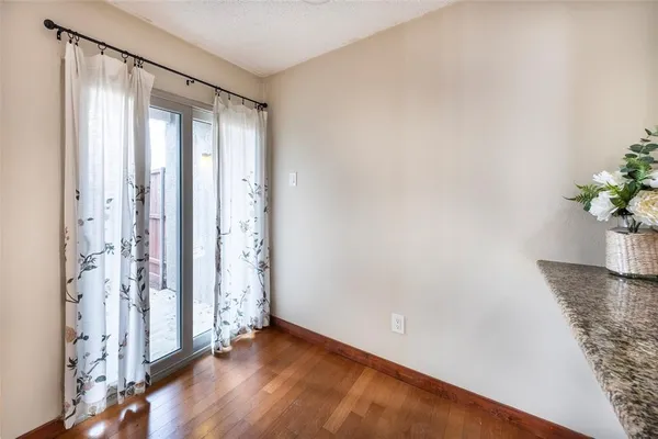 a kitchen with stainless steel appliances a refrigerator and a stove top oven