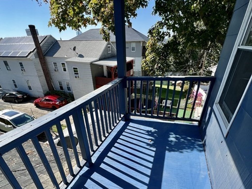 65 Prospect Street Worcester, MA 01605 - Photo 30 of 39 a view of balcony and wooden deck