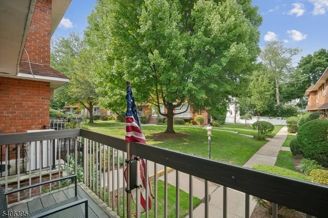 a view of a deck with a yard