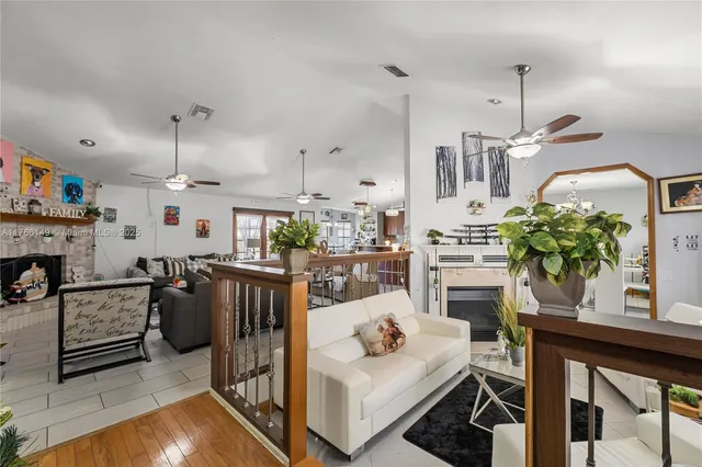 a kitchen with a sink a stove and cabinets