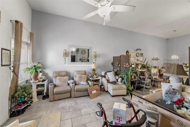 a view of empty room with wooden ceiling
