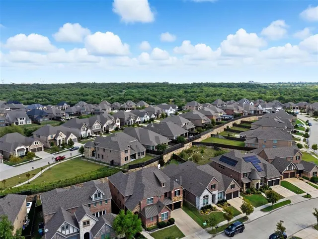 an aerial view of a city with lots of residential buildings