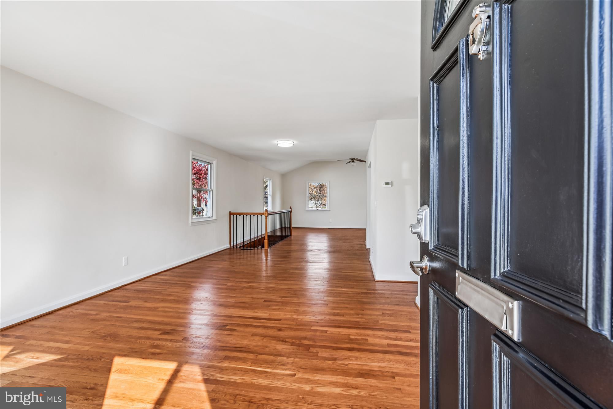 11603 Veirs Mill Road Silver Spring, MD 20902 - Photo 11 of 48 a view of empty room with wooden floor