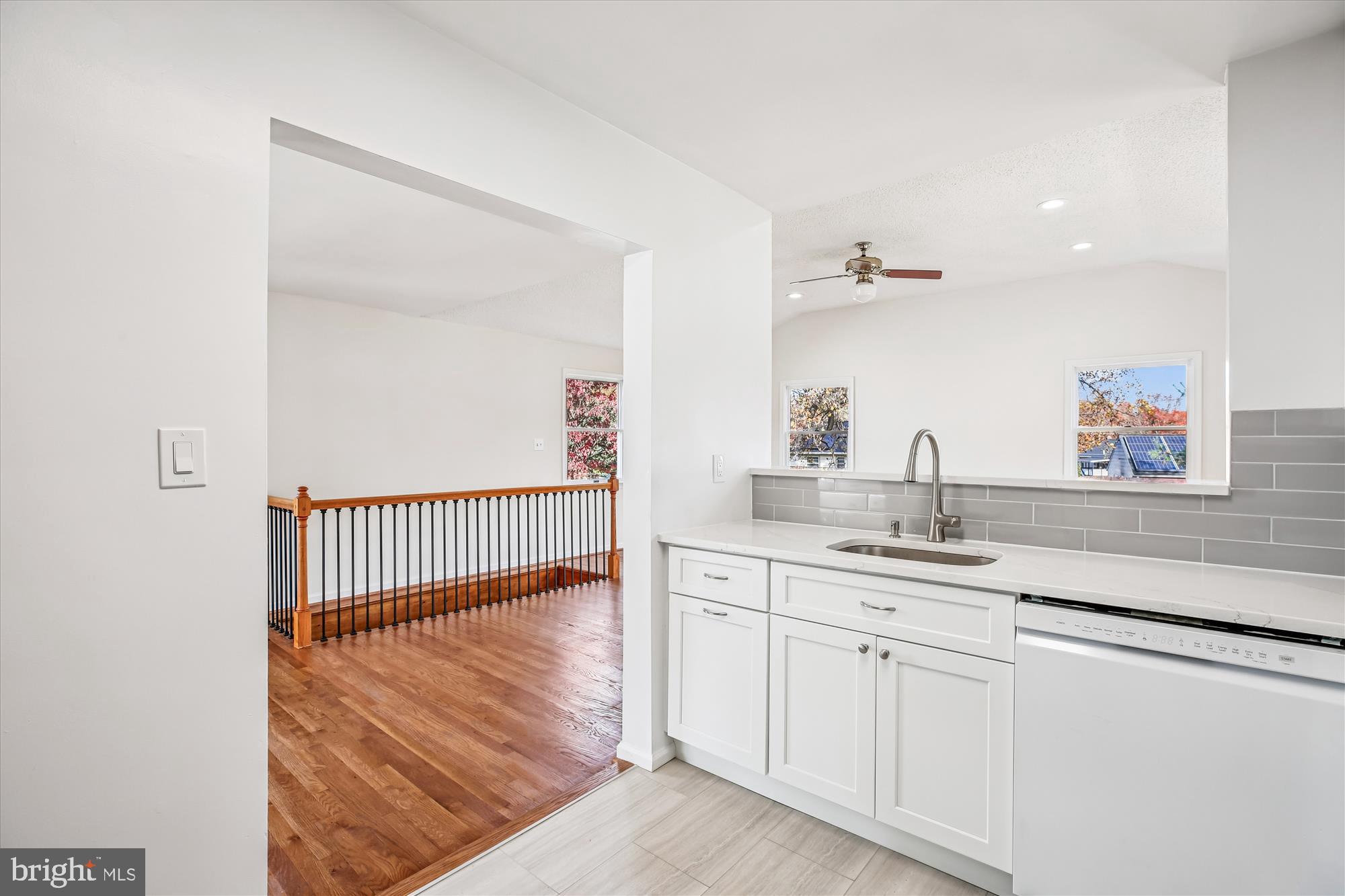 11603 Veirs Mill Road Silver Spring, MD 20902 - Photo 22 of 48 a en suite bathroom with a sink and mirror