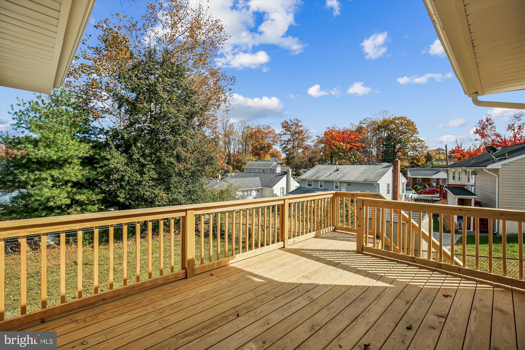 11603 Veirs Mill Road Silver Spring, MD 20902 - Photo 32 of 48 a view of a balcony with wooden fence