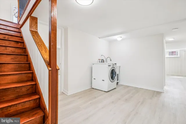 a view of entryway with wooden floor