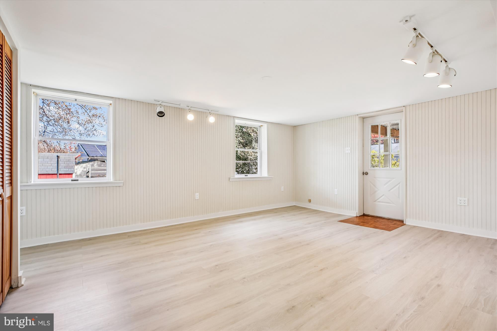 11603 Veirs Mill Road Silver Spring, MD 20902 - Photo 37 of 48 a view of an empty room with a window