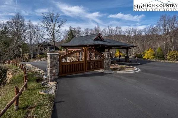 a front view of a house with swimming pool yard and outdoor seating