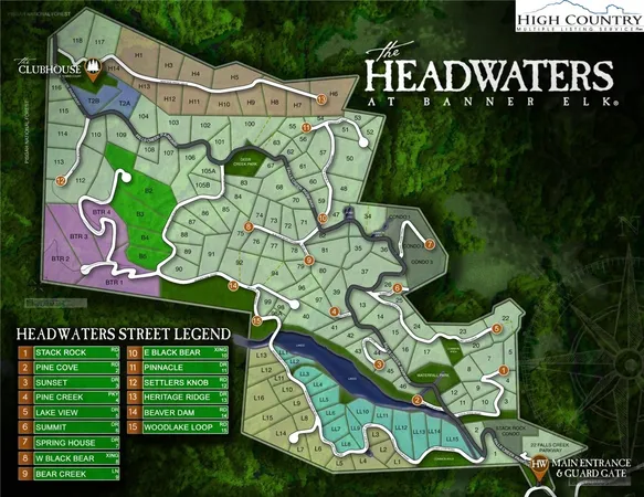 a sign that is on a brick wall with a building in the background