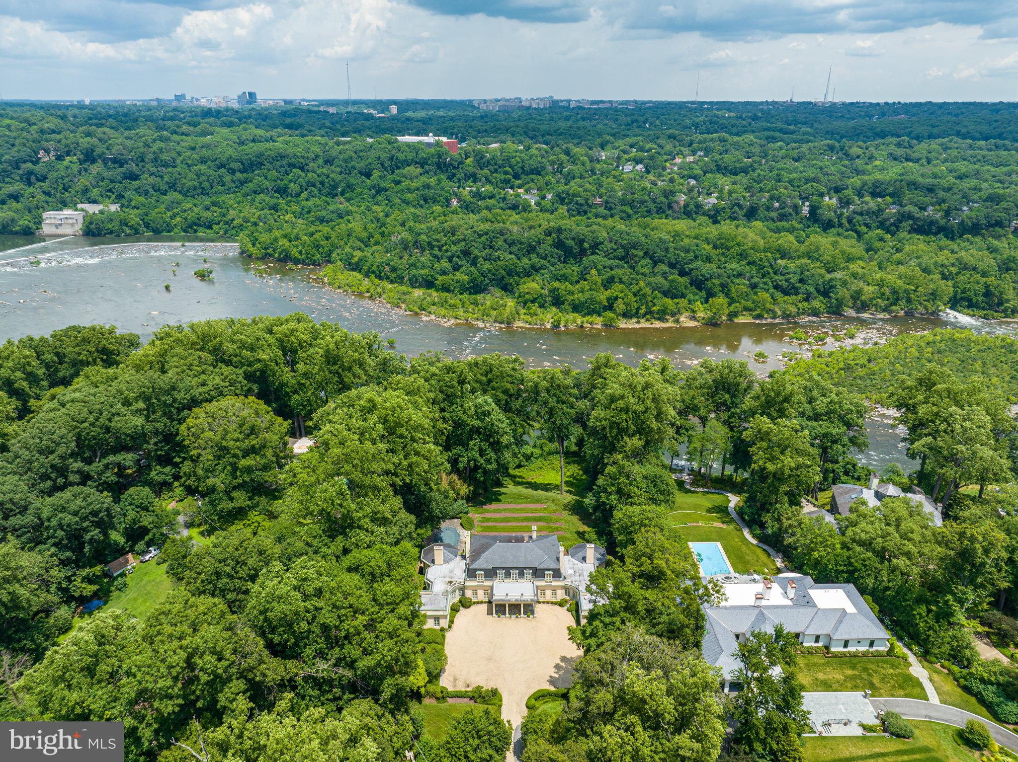 1260 Crest Lane McLean, VA 22101 - Photo 3 of 36 an aerial view of residential houses with outdoor space and swimming pool