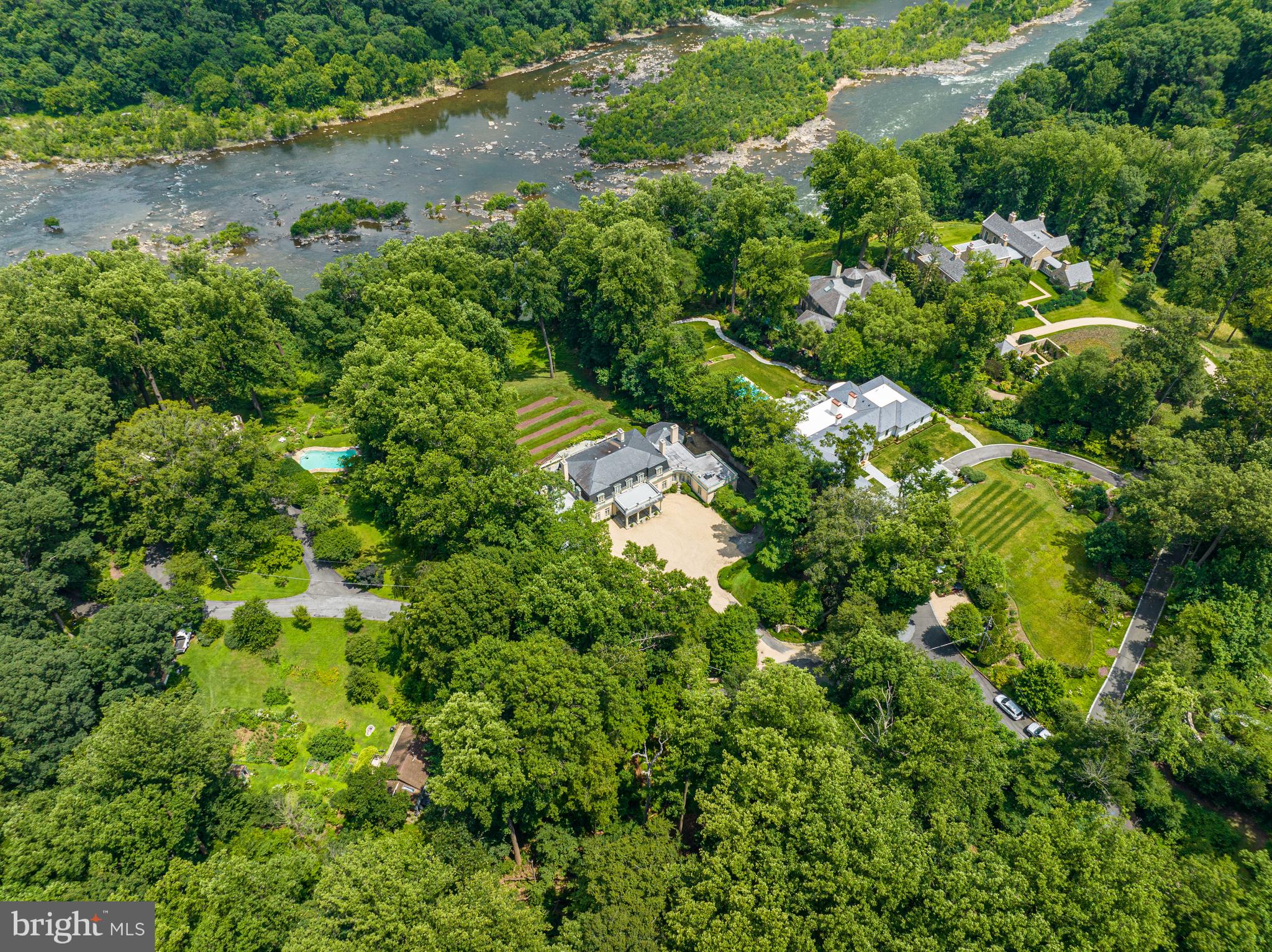 1260 Crest Lane McLean, VA 22101 - Photo 35 of 36 an aerial view of residential houses with outdoor space and trees all around
