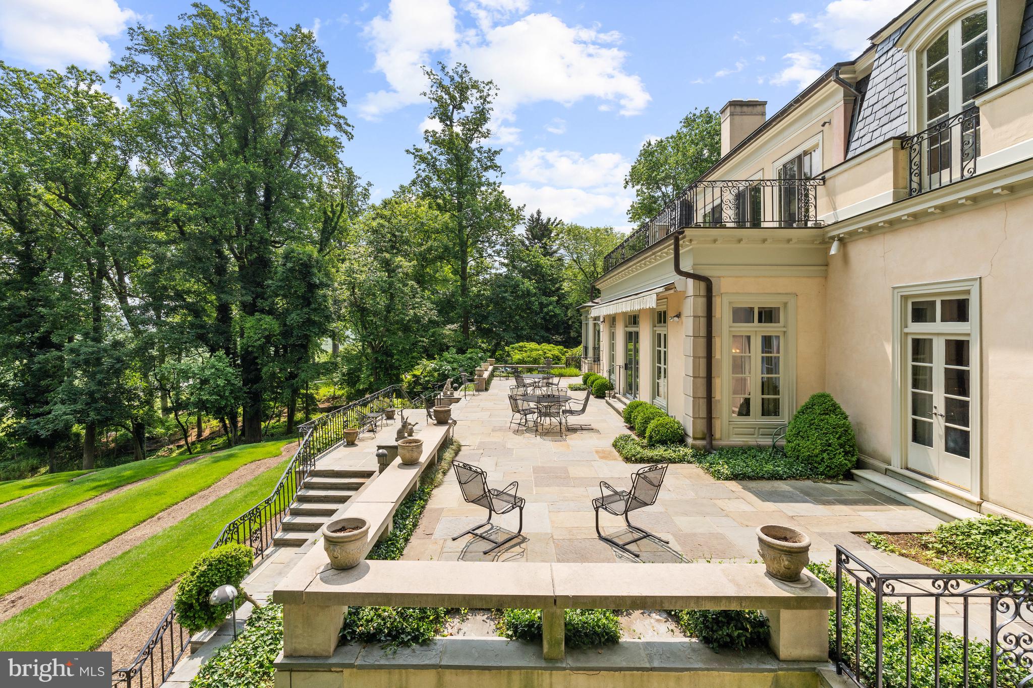 1260 Crest Lane McLean, VA 22101 - Photo 8 of 36 a view of a house with backyard sitting area and garden