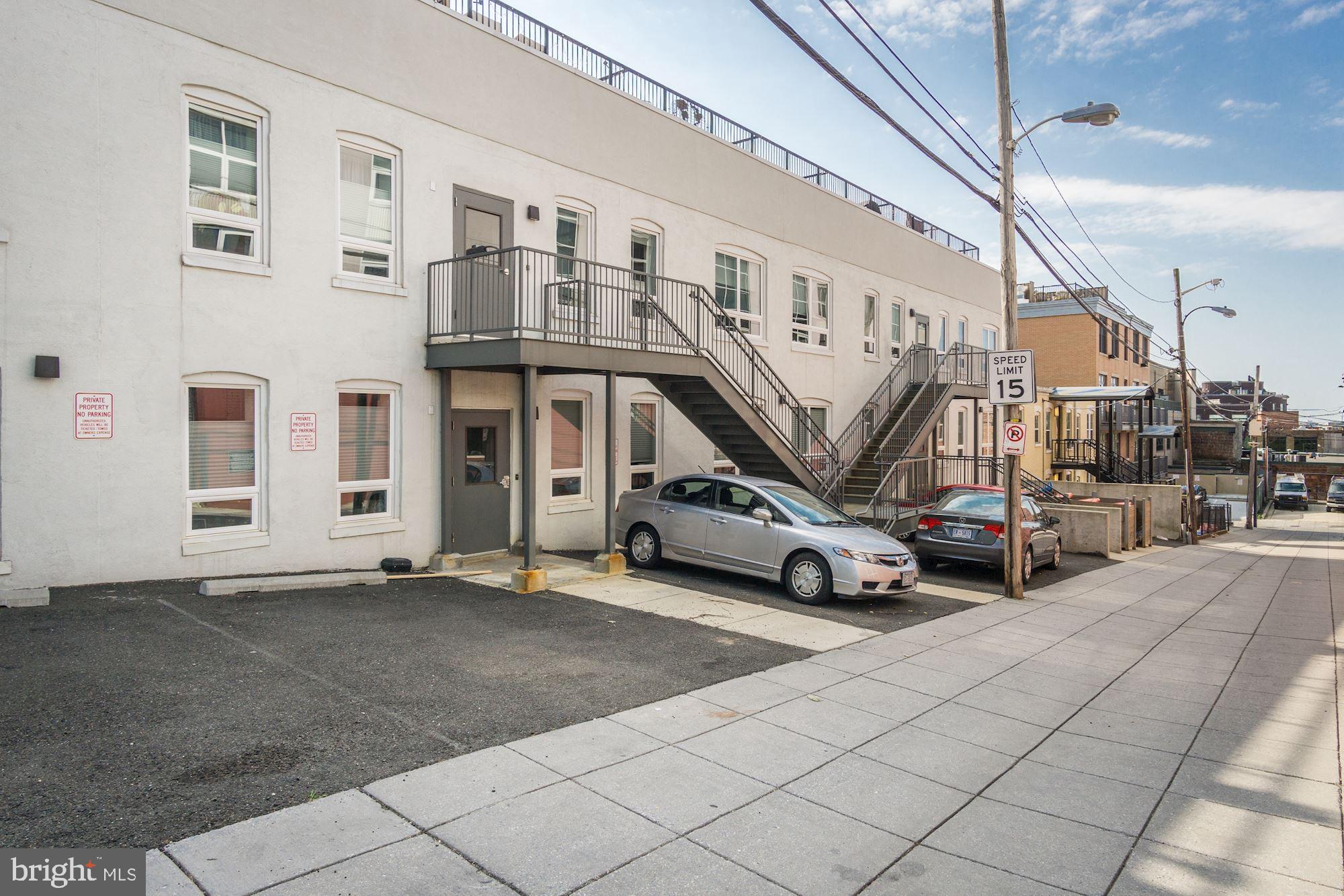 2422-2424 17th Street Northwest, Unit 301 Washington, DC 20009 - Photo 29 of 31 a view of a house with windows