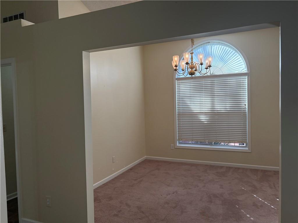 5975 Hillvale Trail Lithonia, GA 30058 - Photo 10 of 10 a view of wooden floor cabinet and fire place
