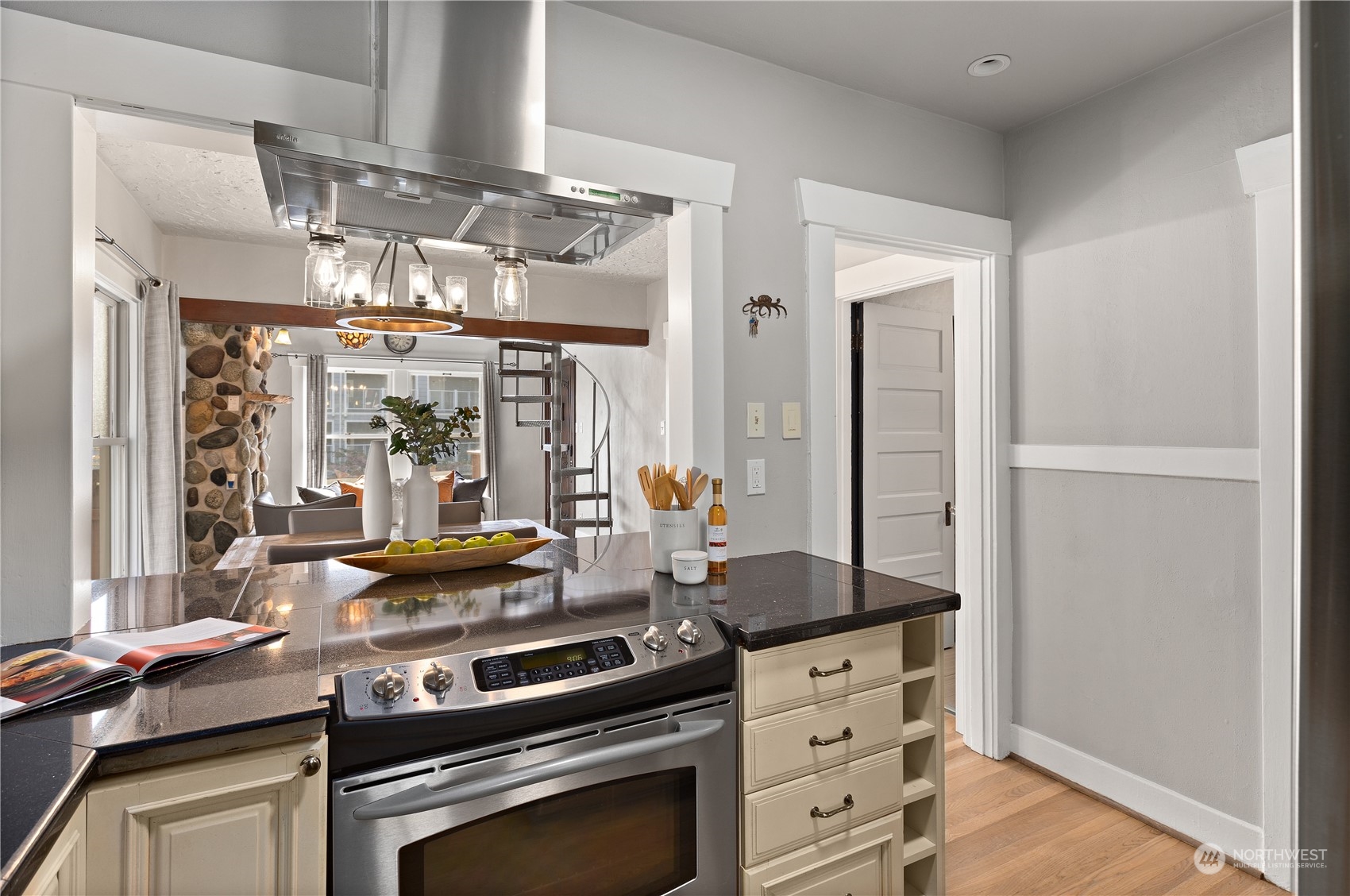 3317 30th Avenue Southwest Seattle, WA 98126 - Photo 13 of 28 a kitchen with a stove and a sink