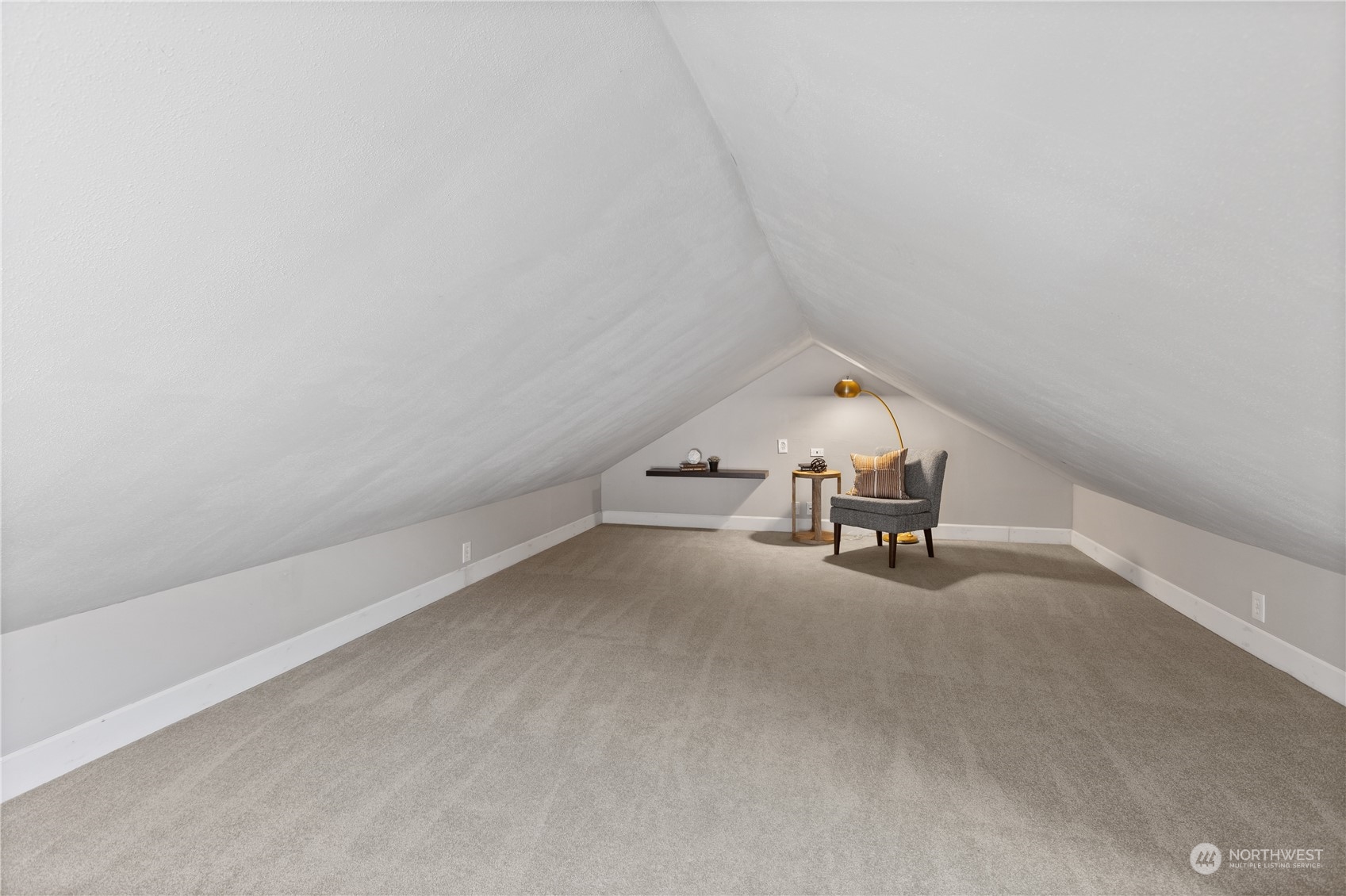 3317 30th Avenue Southwest Seattle, WA 98126 - Photo 18 of 28 a view of a room with racks on the wall