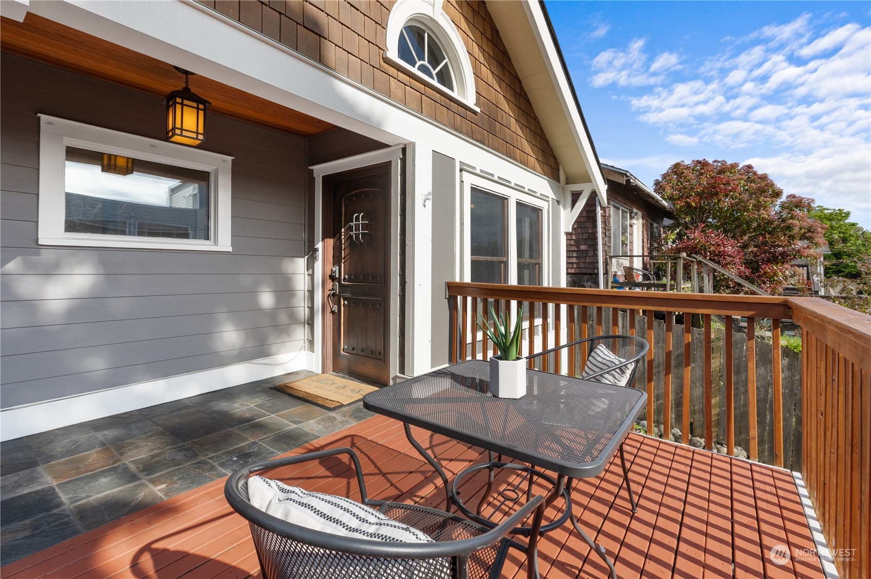 3317 30th Avenue Southwest Seattle, WA 98126 - Photo 2 of 28 a balcony view with a seating space