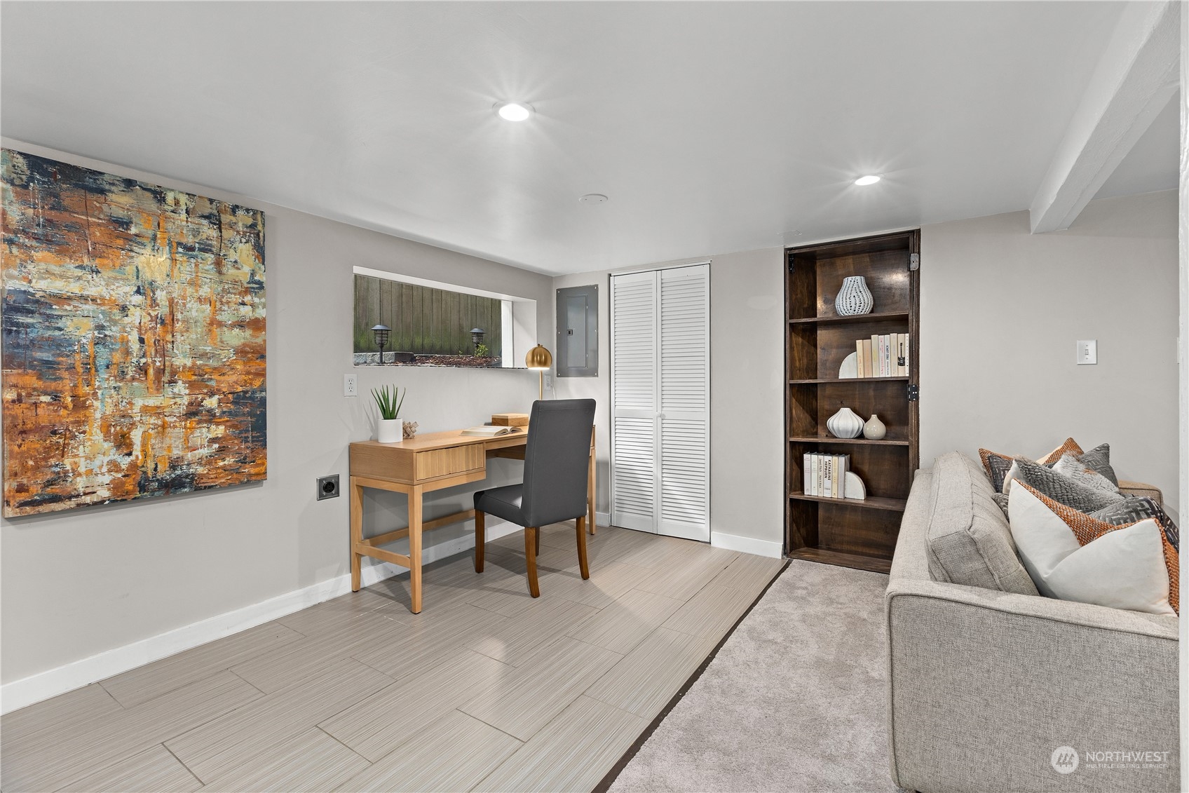 3317 30th Avenue Southwest Seattle, WA 98126 - Photo 21 of 28 a view of a livingroom with furniture and workspace