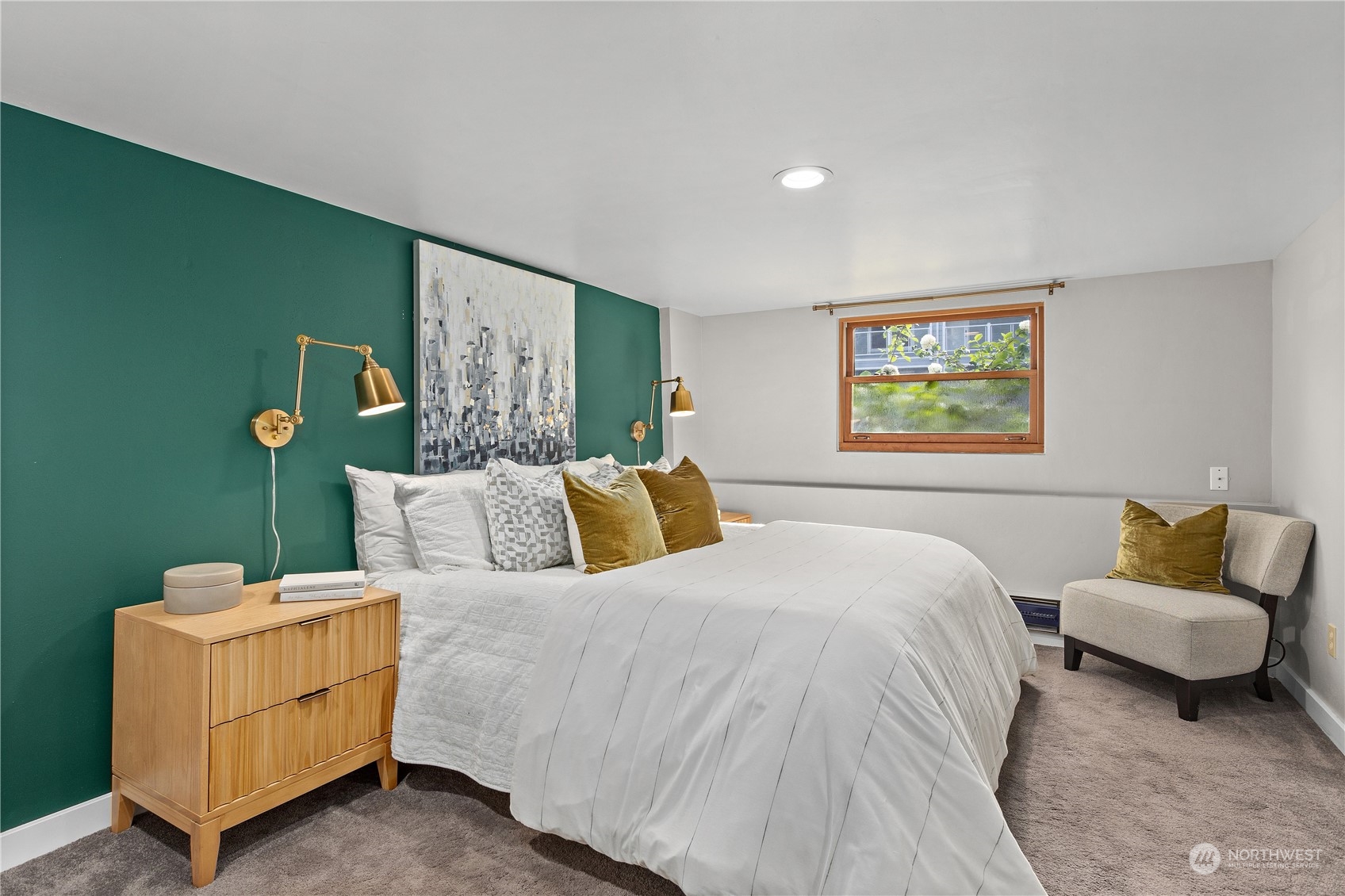 3317 30th Avenue Southwest Seattle, WA 98126 - Photo 22 of 28 a bedroom with a bed and couch