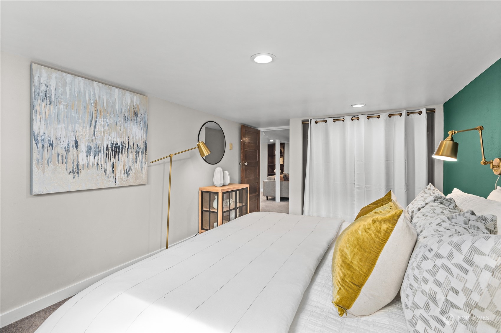 3317 30th Avenue Southwest Seattle, WA 98126 - Photo 23 of 28 a bedroom with a bed and a window