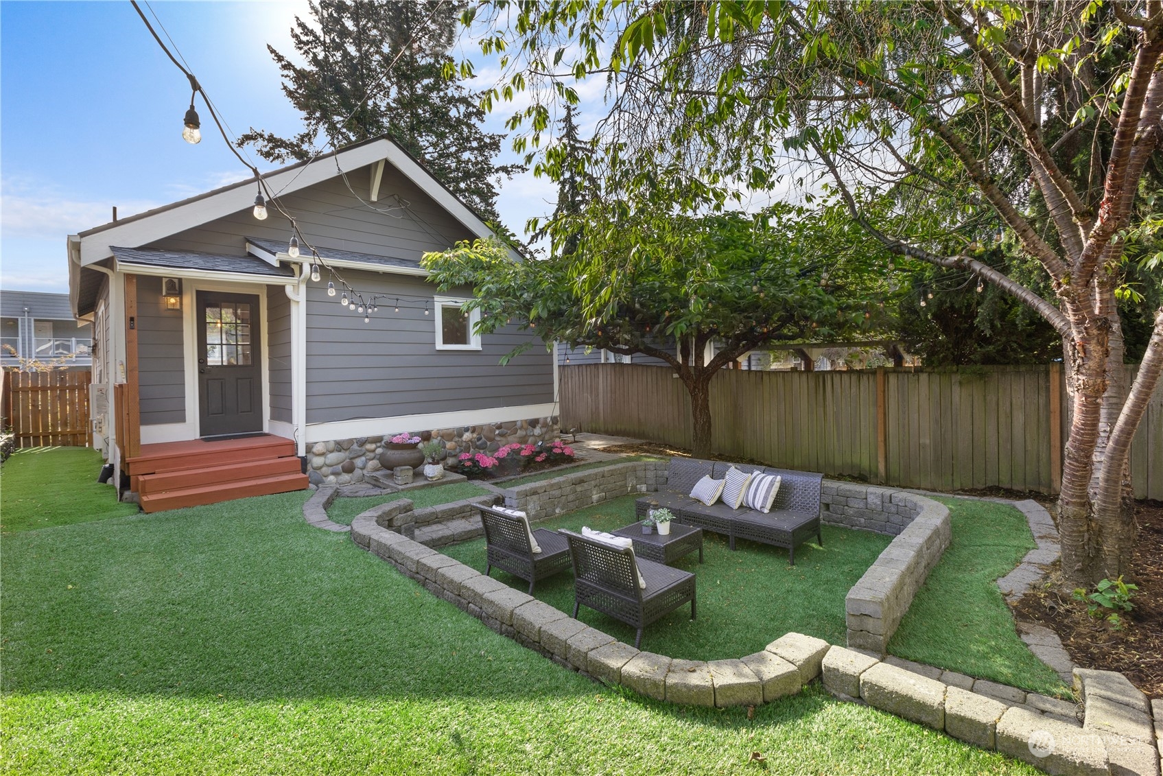 3317 30th Avenue Southwest Seattle, WA 98126 - Photo 25 of 28 a front view of a house with garden
