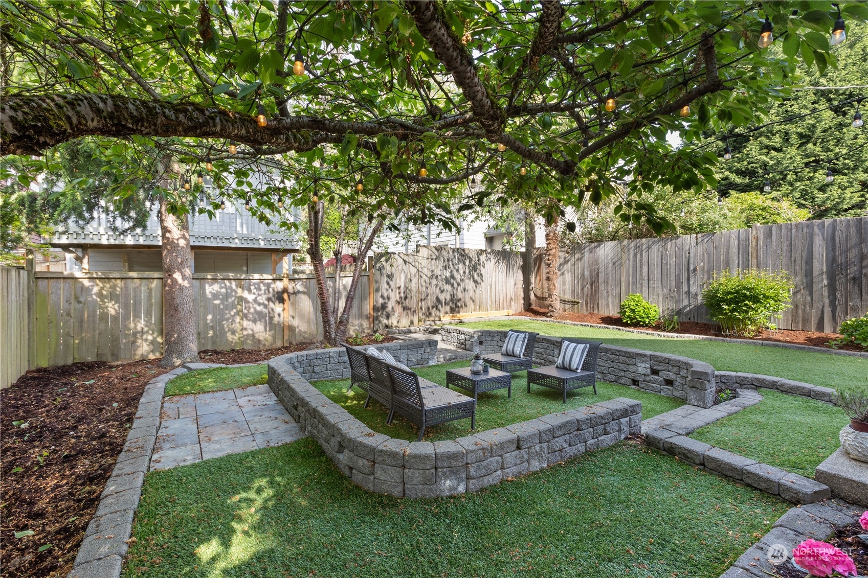 3317 30th Avenue Southwest Seattle, WA 98126 - Photo 27 of 28 a garden view with a seating space