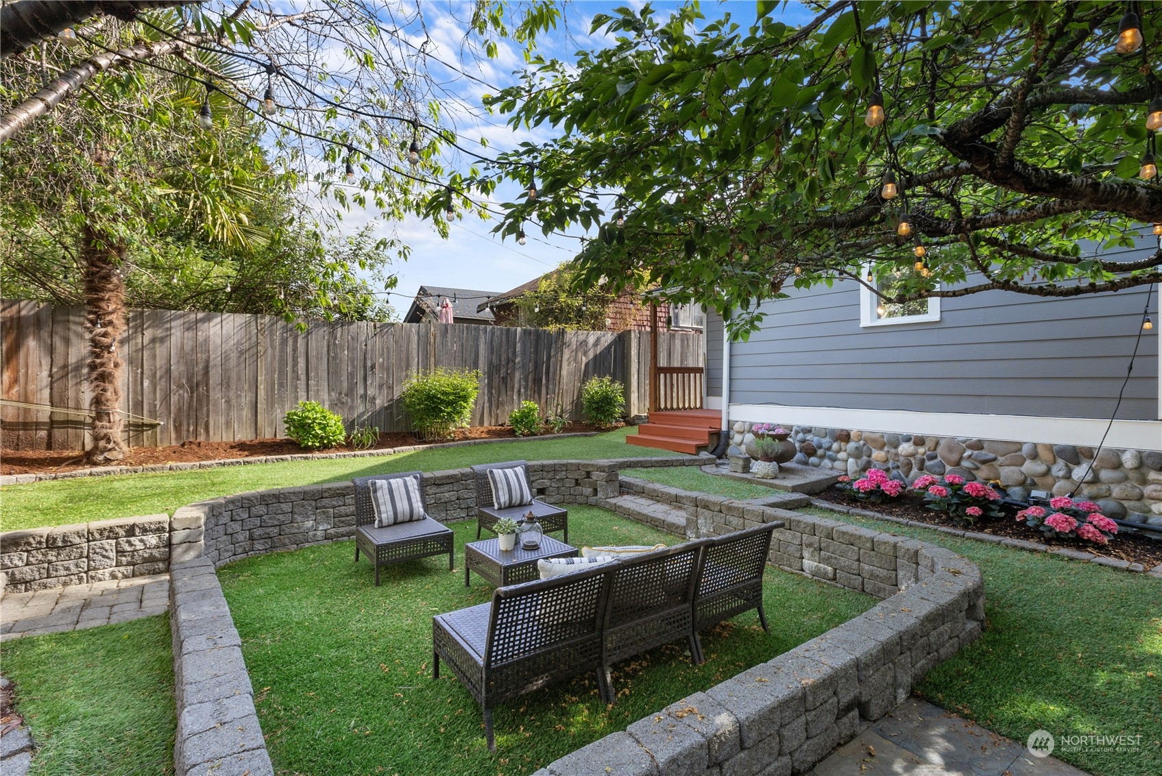 3317 30th Avenue Southwest Seattle, WA 98126 - Photo 28 of 28 a garden view with a seating space