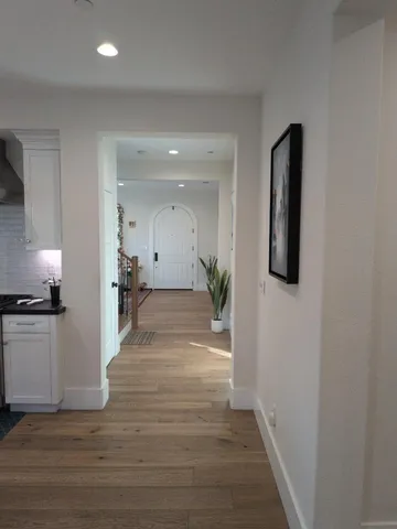 a view of a hallway view with staircase