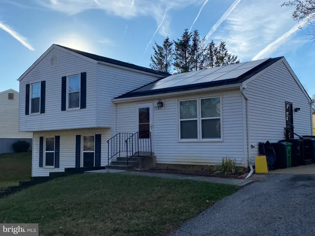 a view of a yard in front of a house