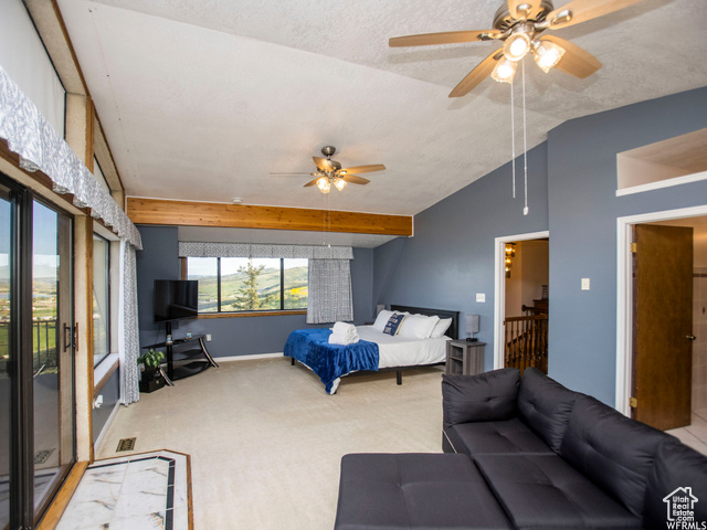 588 Raspberry Patch Road Garden City, UT 84028 - Photo 46 of 74 Bedroom featuring carpet floors, a textured ceiling, a ceiling fan, and attic access