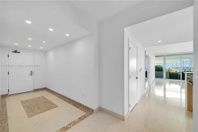 a view of a hallway of a house